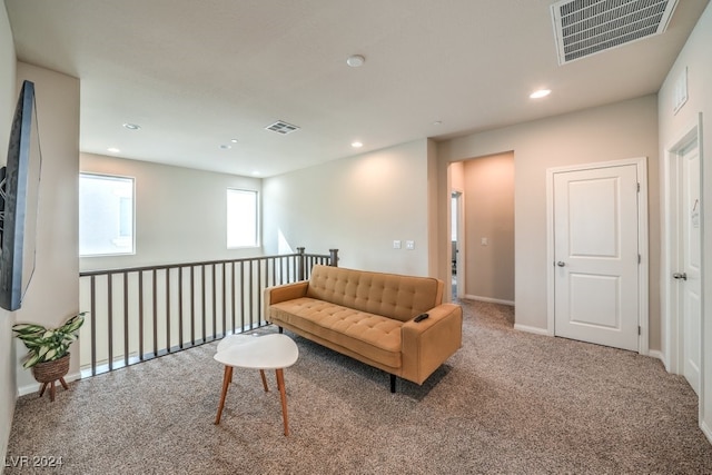 sitting room featuring carpet floors