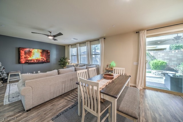 dining area featuring hardwood / wood-style flooring and ceiling fan