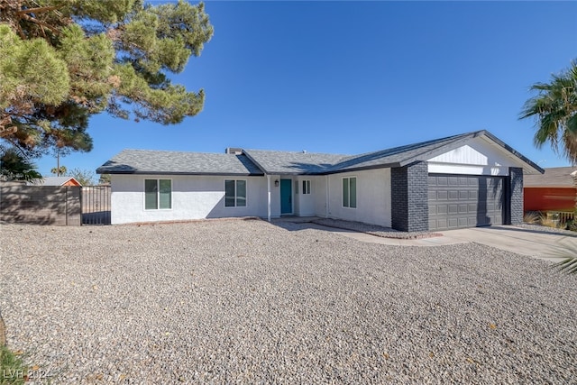 single story home with a garage