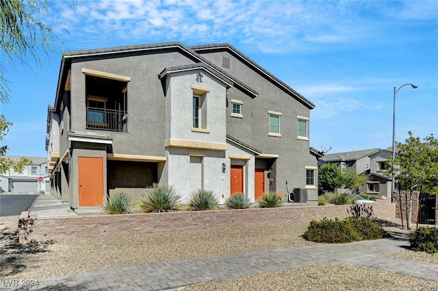 view of front of house with central AC unit