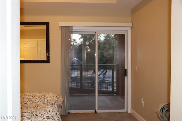 doorway featuring carpet