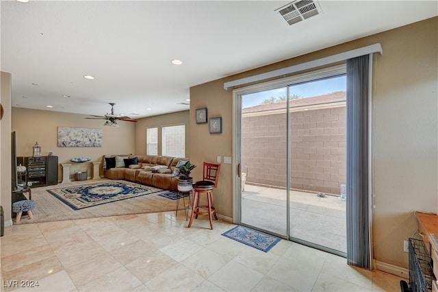 living room featuring ceiling fan