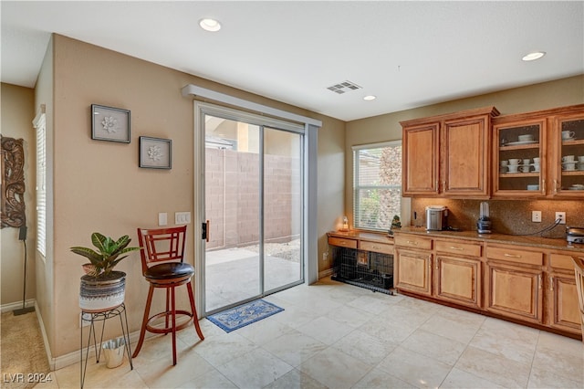 kitchen featuring backsplash