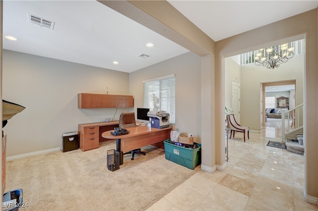 office area with a chandelier