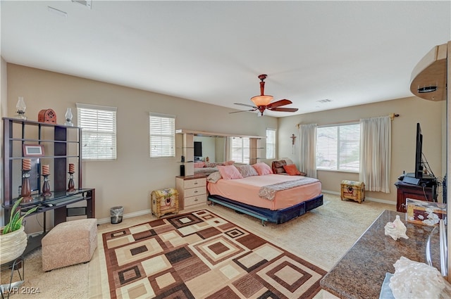 bedroom featuring carpet and ceiling fan