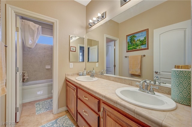 bathroom featuring toilet, tile patterned flooring, and vanity