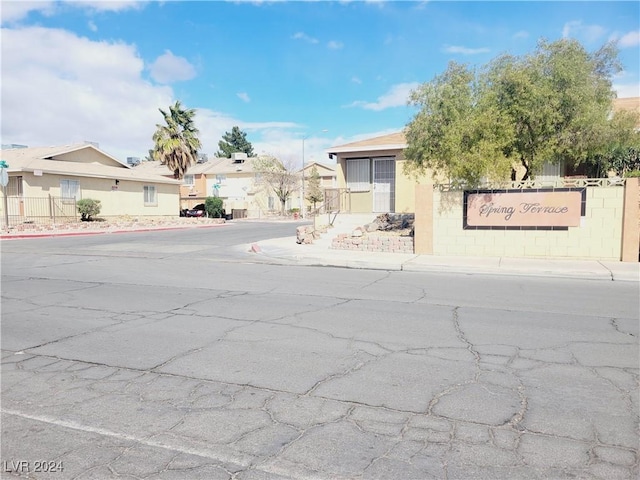 exterior space featuring sidewalks and a residential view