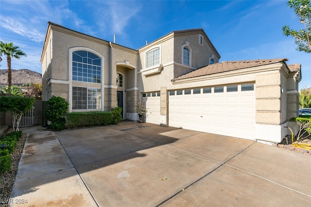 front of property featuring a garage