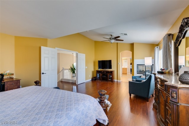 bedroom featuring ceiling fan and dark hardwood / wood-style flooring