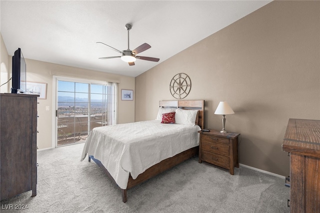 carpeted bedroom featuring access to exterior, ceiling fan, and lofted ceiling