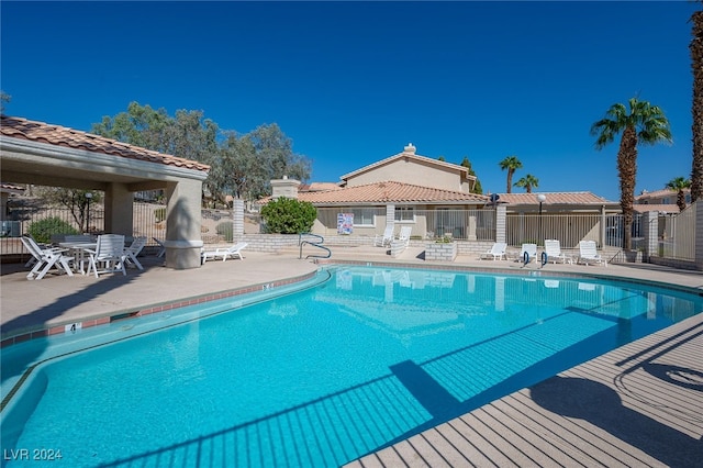 view of swimming pool featuring a patio