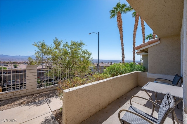 balcony featuring a mountain view