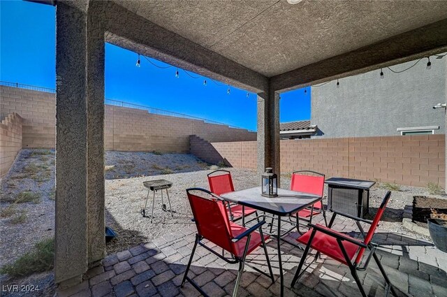 view of patio / terrace featuring a fenced backyard and outdoor dining area