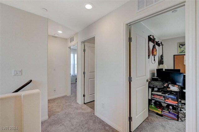 corridor with recessed lighting, baseboards, visible vents, and carpet floors