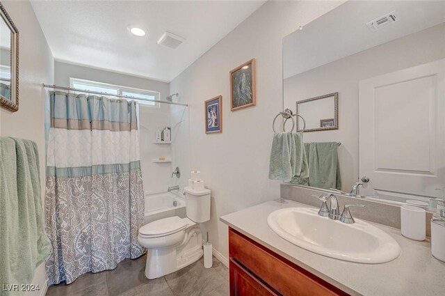 full bathroom featuring toilet, vanity, shower / tub combo with curtain, and visible vents
