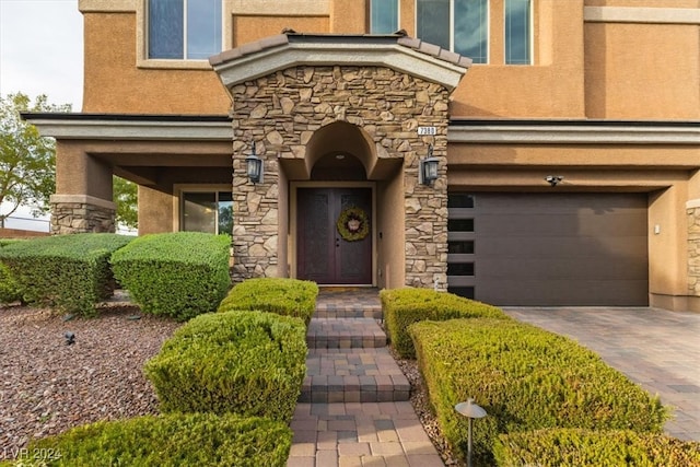 entrance to property with a garage