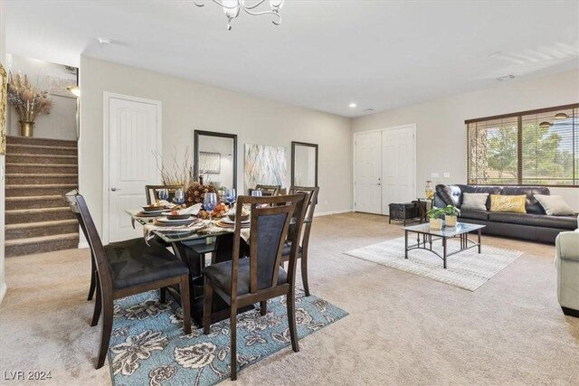 dining area with light carpet