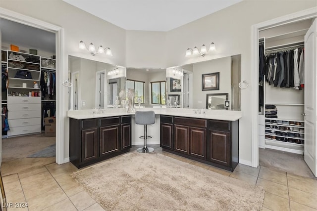 bathroom featuring vanity and tile patterned flooring