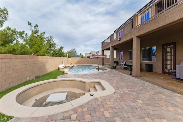 view of pool with a patio area