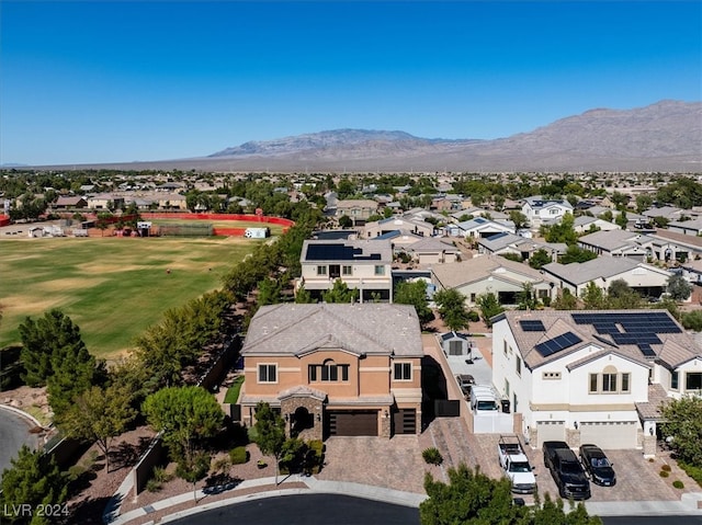 drone / aerial view featuring a mountain view