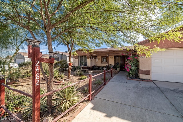 view of front of property with a garage