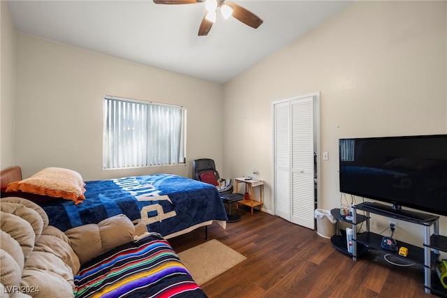 bedroom with ceiling fan, a closet, vaulted ceiling, and dark hardwood / wood-style flooring