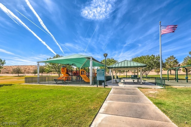 view of home's community with a lawn, playground community, and a gazebo