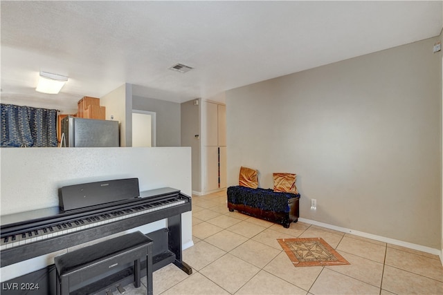 miscellaneous room featuring light tile patterned flooring