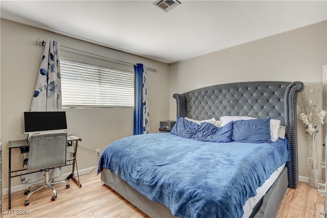 bedroom featuring hardwood / wood-style flooring