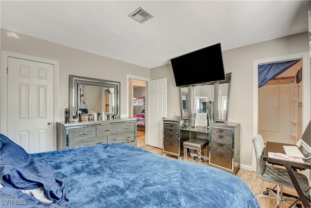 bedroom featuring light hardwood / wood-style floors