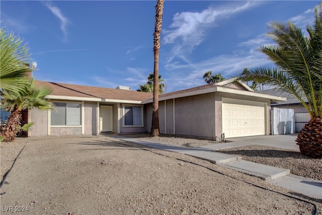 ranch-style house with a garage