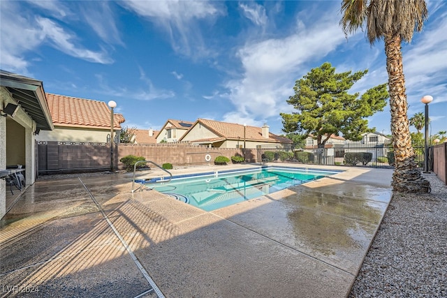 view of pool featuring a patio