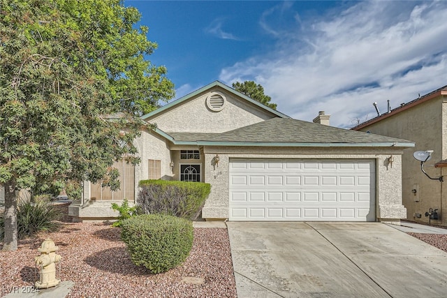 ranch-style home with a garage