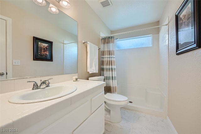 bathroom featuring vanity, toilet, and a shower with curtain