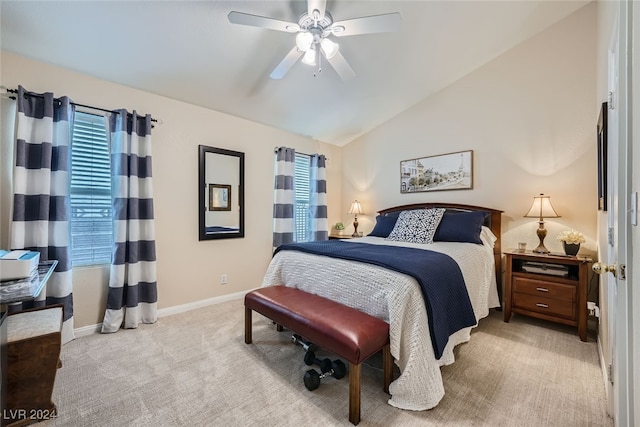 carpeted bedroom featuring ceiling fan and lofted ceiling