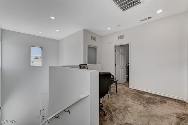 office space with carpet floors and visible vents