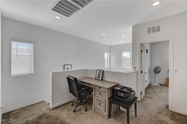 office space featuring light carpet, visible vents, and recessed lighting