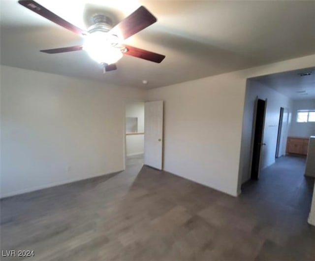 interior space featuring dark hardwood / wood-style floors and ceiling fan