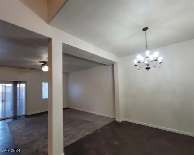 interior space with ceiling fan with notable chandelier