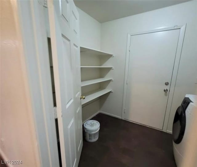 clothes washing area with washer / clothes dryer