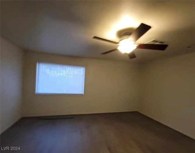 spare room with ceiling fan