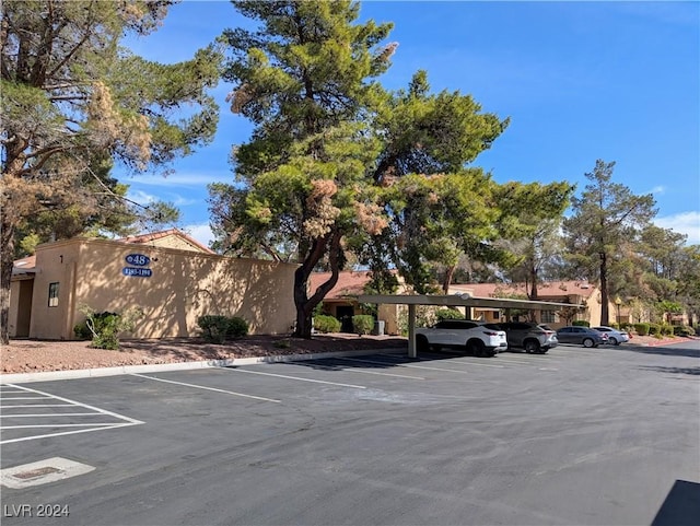 view of car parking with a carport