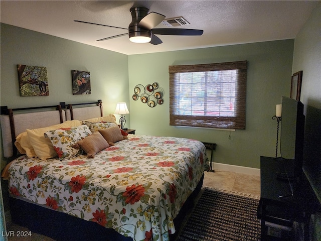 bedroom featuring ceiling fan