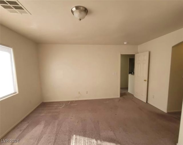 empty room featuring carpet