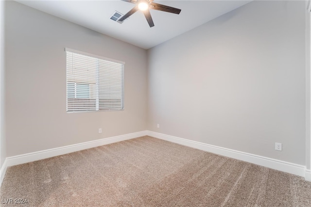 empty room with carpet floors and ceiling fan