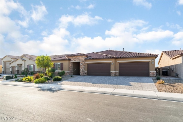 view of front of home featuring a garage