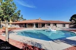 view of pool featuring a patio