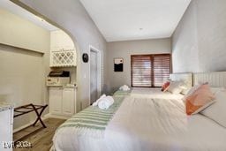 bedroom featuring hardwood / wood-style flooring