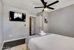 bedroom featuring ceiling fan and hardwood / wood-style floors