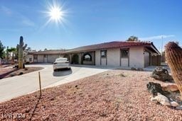 ranch-style house with a patio area